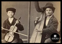 Old black and white photo of two people playing string instruments
