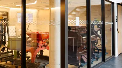 Looking into a room through glass walls
